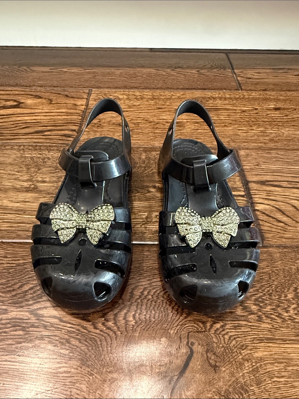 Girls Crocs Black Jelly Sandals with Decorative Jeweled Bow